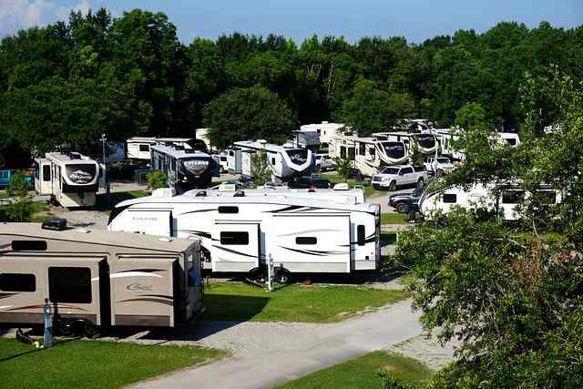 A beautiful sunrise at a rv resort with motor homes and tent camping